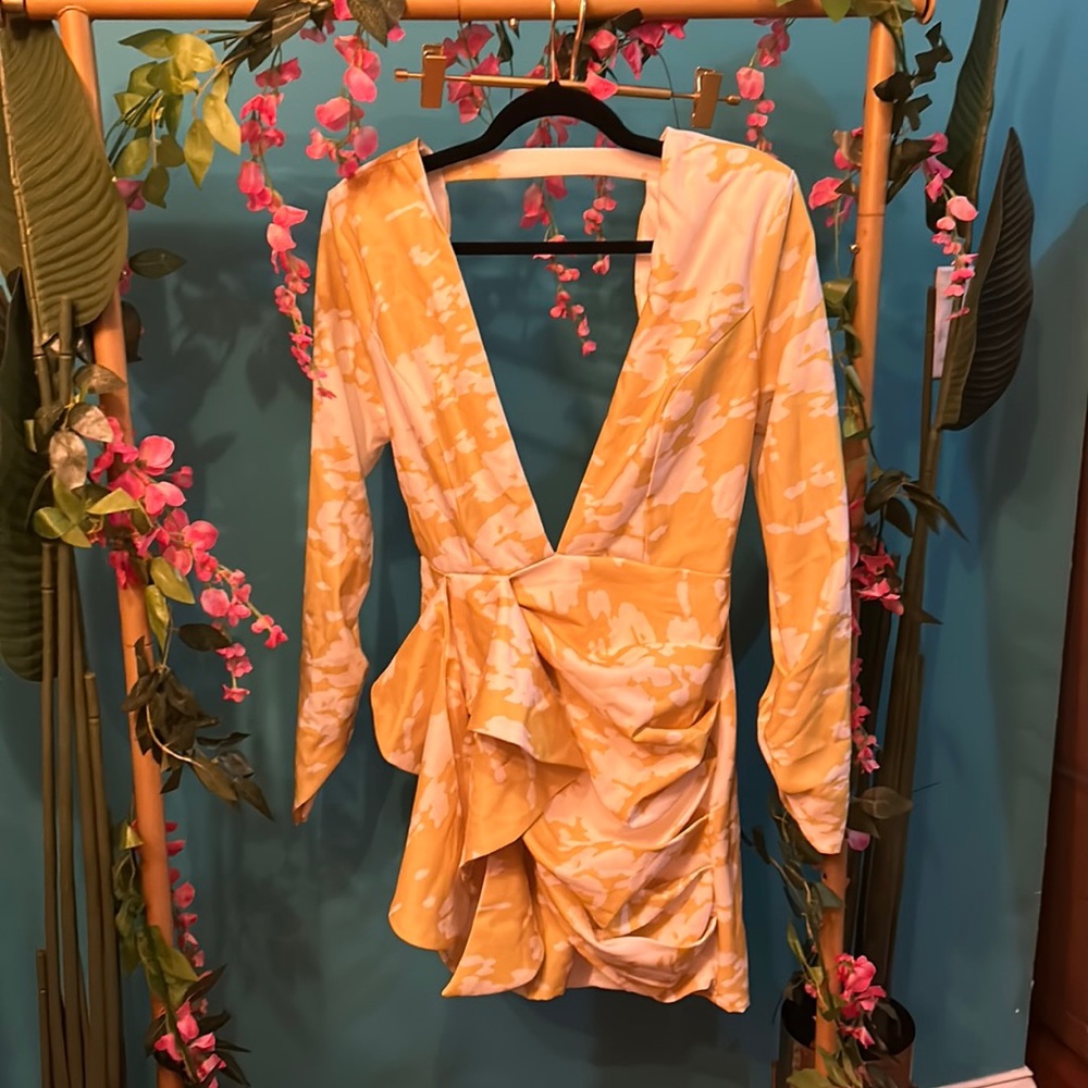 Deep plunge yellow and white back out mini dress
